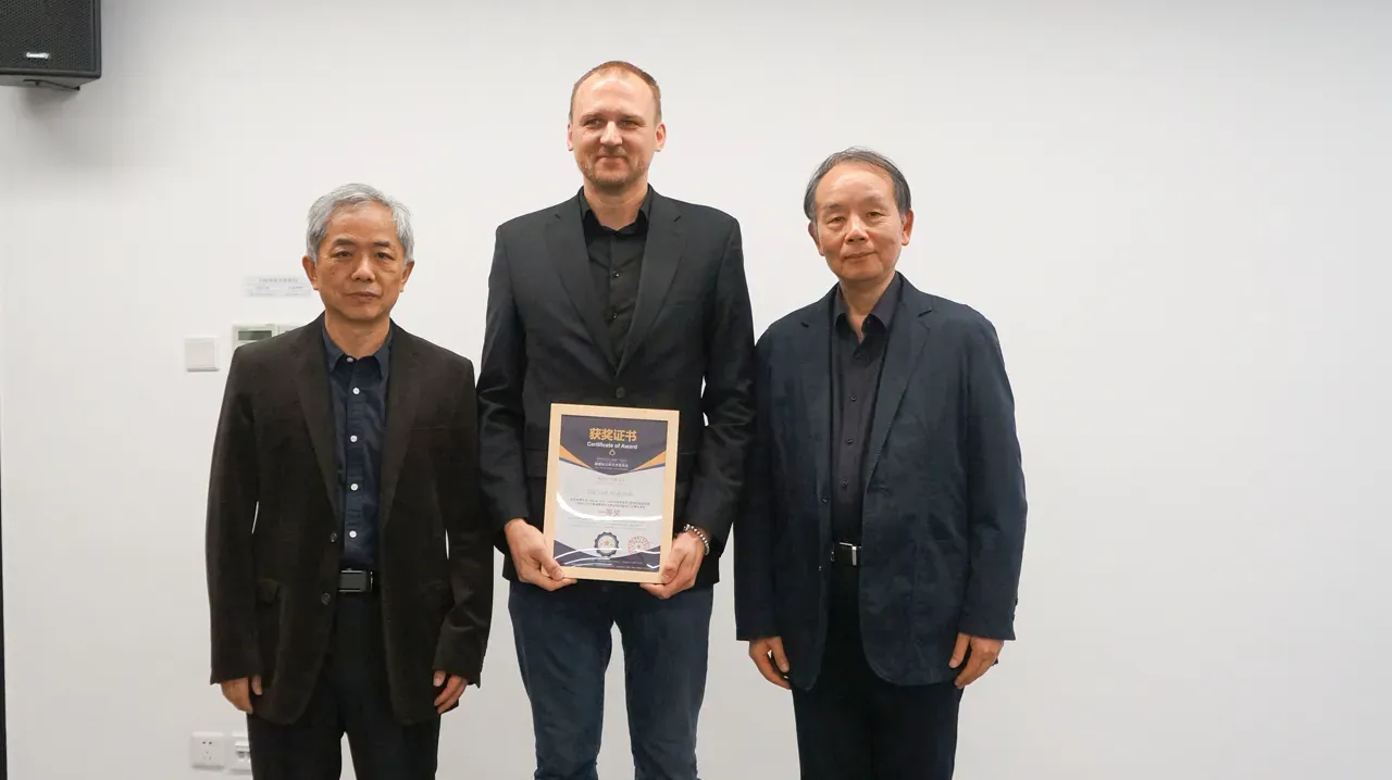 Dariusz Makaruk from MediaCraft receiving the Grand Prix in Shenzhen